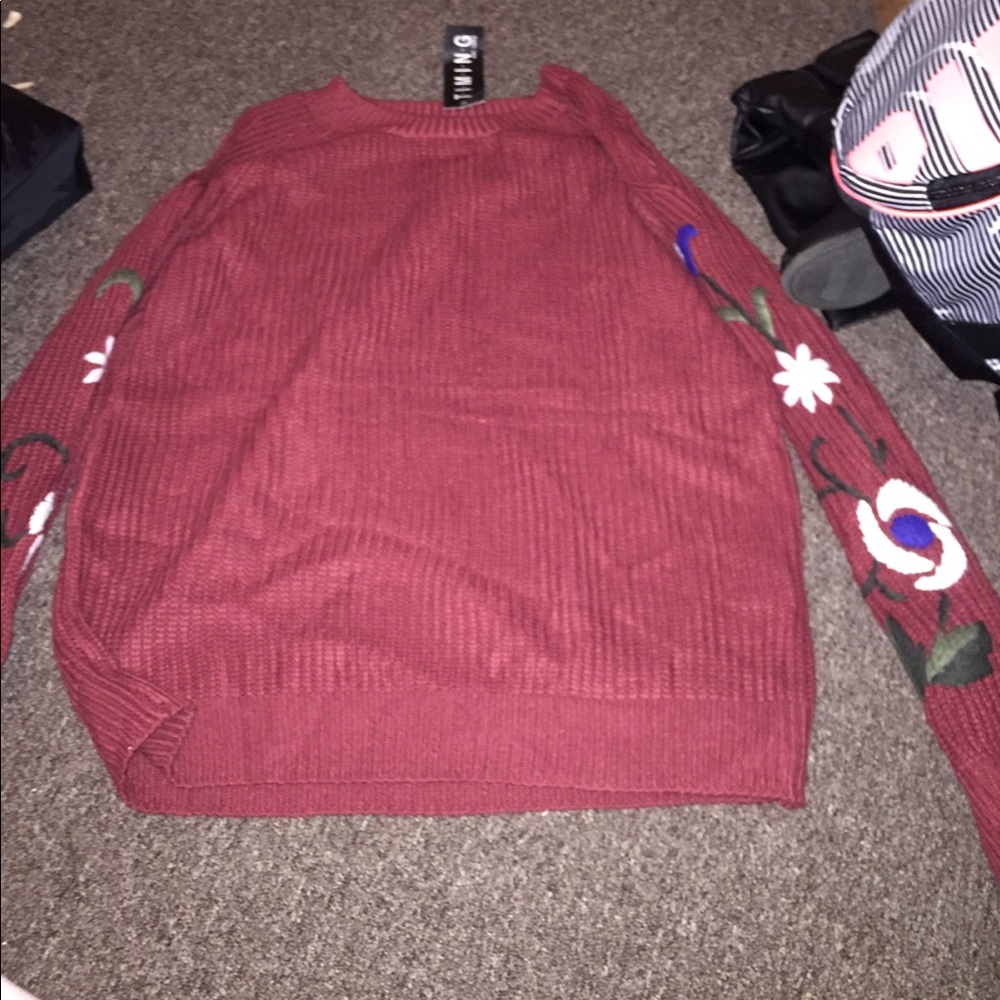 size large burgundy sweater with floral sleeves